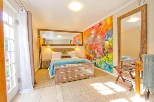 Letto o letti in una camera di Villa Costa Rose