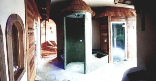 a room with a large mirror on the floor at Affittacamere Dolce Sogno in Coredo