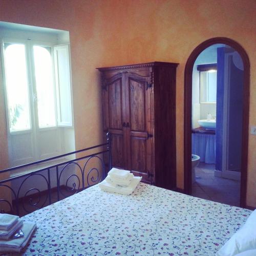 Letto o letti in una camera di B&B MilleQuattrocento