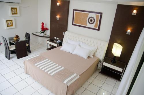 Ένα ή περισσότερα κρεβάτια σε δωμάτιο στο Vitoria Palace Hotel