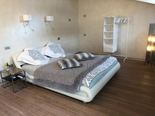Säng eller sängar i ett rum på B&B Borgo Marina