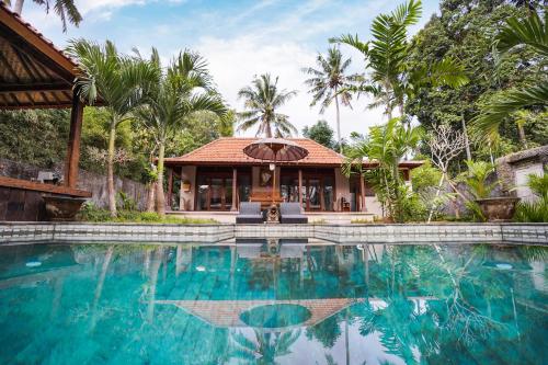 Πισίνα στο ή κοντά στο Sunny Sun Ubud Private Villa