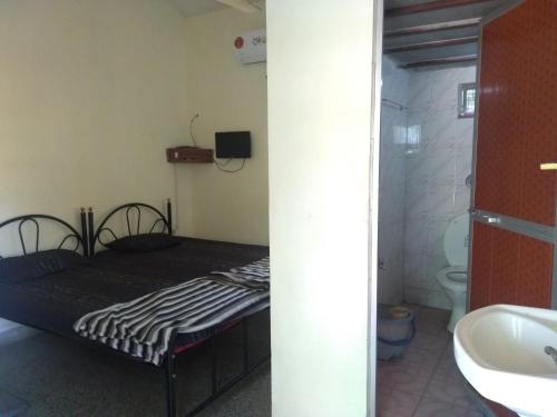 Koupelna v ubytování Stay Goa Guesthouse
