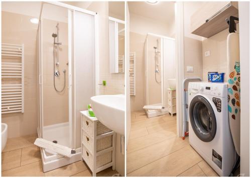 a bathroom with a washing machine and a washer at Il Nido Di Giambra in La Spezia