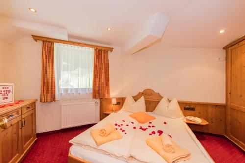 Postel nebo postele na pokoji v ubytování Landhotel Hinteraigengut