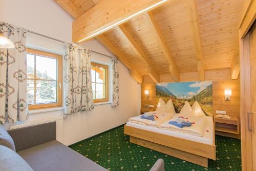 Postel nebo postele na pokoji v ubytování Apartments Unterfischergut