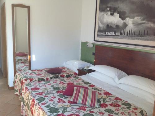 Ένα ή περισσότερα κρεβάτια σε δωμάτιο στο Hotel Sovestro