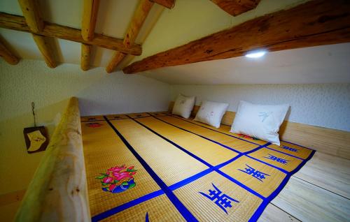 Кровать или кровати в номере Jungdam