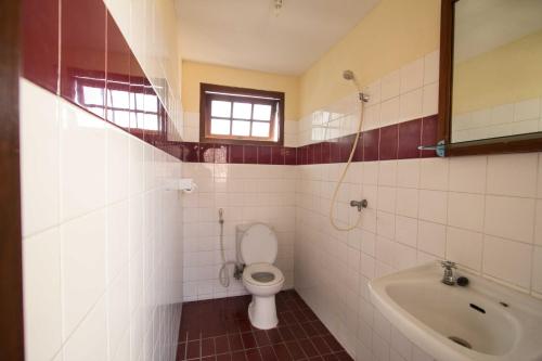 Ванная комната в Duta Guest House