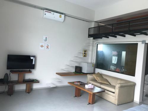 TV a/nebo společenská místnost v ubytování Chef Nirvana Spa Pool Villa