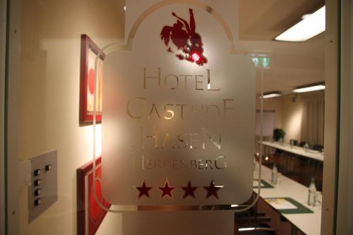 a sign for a hotel casoit fischerhenge at Ringhotel Gasthof Hasen in Herrenberg