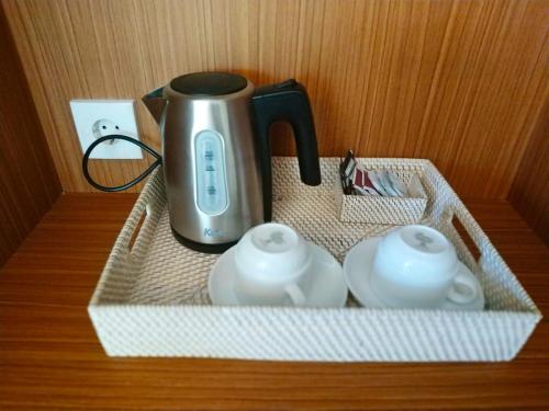 Kemudahan buat kopi dan teh di Annupuri Villas Bali