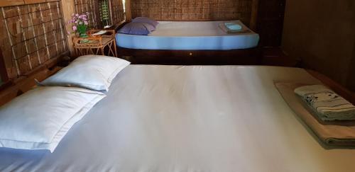 Letto o letti in una camera di Khim Vouch Ay Rabbit island