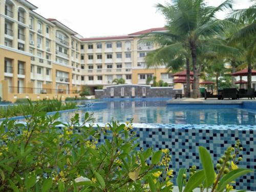 a view of the resort from the pool at Stay at Sanremo Oasis Cebu in Cebu City