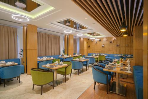 Blu Feather Hotel & Spa tesisinde bir restoran veya yemek mekanı
