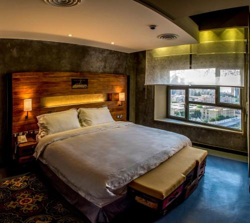 Katil atau katil-katil dalam bilik di Flowery Holiday Suites