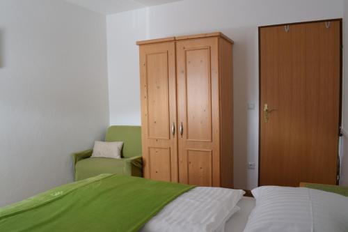 Postel nebo postele na pokoji v ubytování Landhaus Holzer