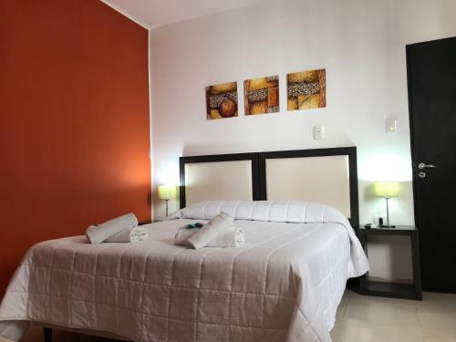 Ein Bett oder Betten in einem Zimmer der Unterkunft Hotel Pucará