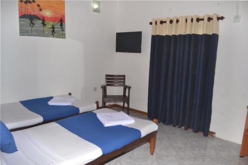 Postel nebo postele na pokoji v ubytování Hotel Thilon