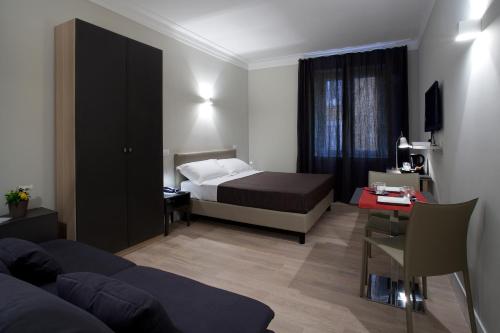 Una cama o camas en una habitación de Regola Suite