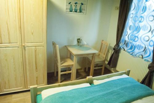 Ein Bett oder Betten in einem Zimmer der Unterkunft Apartmany Silverado