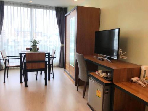 TV a/nebo společenská místnost v ubytování Triple B Boutique Residence