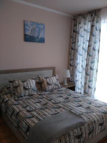 Un pat sau paturi într-o cameră la Villa Gracia