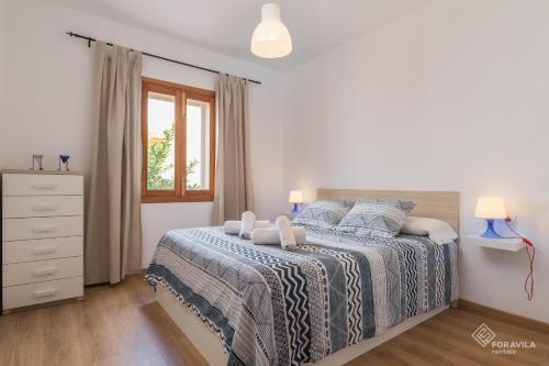 Postel nebo postele na pokoji v ubytování Casa Embat