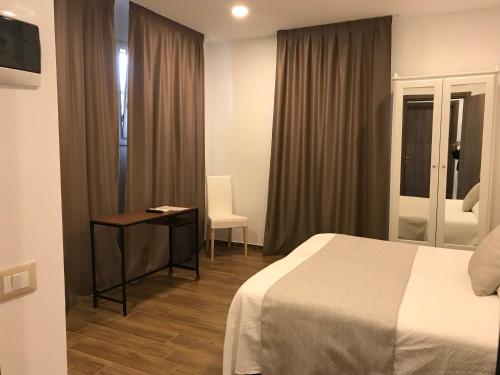 Postel nebo postele na pokoji v ubytování Hotel Cambogia
