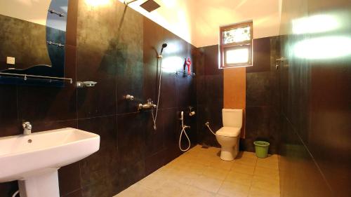 Ett badrum på Guest House Basilea