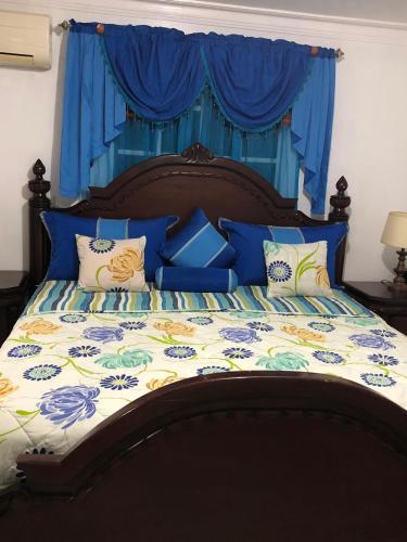 Una cama o camas en una habitación de Paradise 3 cerro Altos