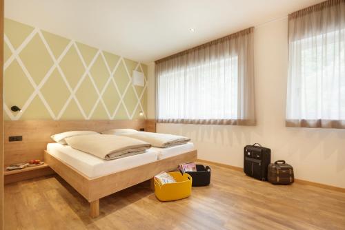 Postel nebo postele na pokoji v ubytování Appartments Waage