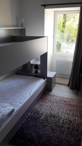 Postel nebo postele na pokoji v ubytování Taillefer