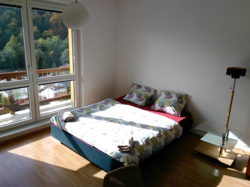 Posteľ alebo postele v izbe v ubytovaní Apartmán Maruška