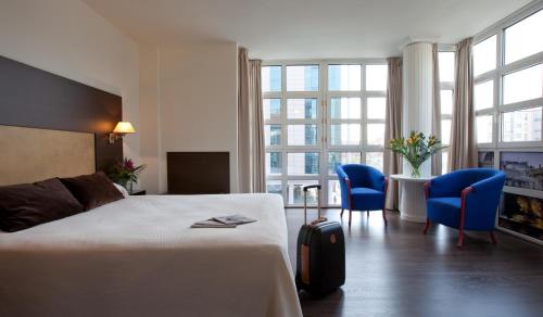 Posteľ alebo postele v izbe v ubytovaní Hotel Madrid Torrejon Plaza