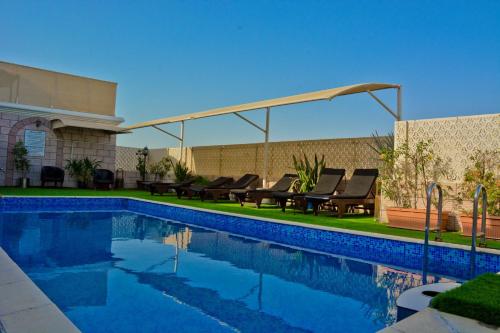 Al Maha Int Hotel Oman 내부 또는 인근 수영장