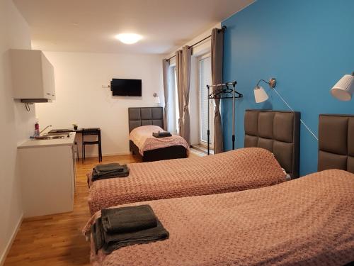 Télévision ou salle de divertissement dans l'établissement Hotel Kringelstaden