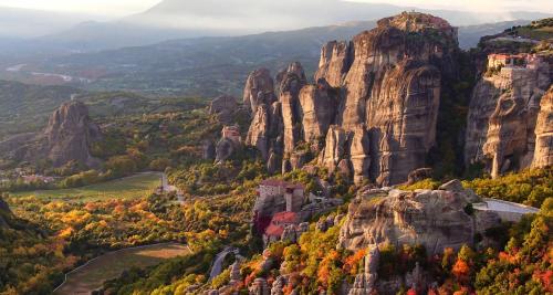 a view of meteoria in the autumn with mountains at Rocks Republic in Kalabaka