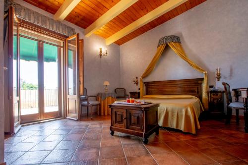 Postel nebo postele na pokoji v ubytování Hotel Il Podere