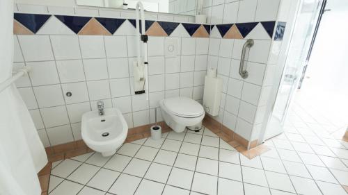 Ένα μπάνιο στο Hotel Garni Landhaus zur Issel