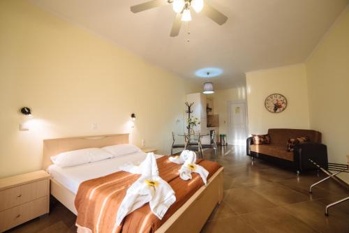 Ένα ή περισσότερα κρεβάτια σε δωμάτιο στο Villa Agiolina 