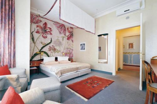 מיטה או מיטות בחדר ב-Hotel Jugendstil