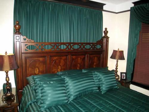 Ένα ή περισσότερα κρεβάτια σε δωμάτιο στο The Polo Inn Bridgeport U.S.A.