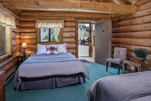 Postel nebo postele na pokoji v ubytování Triangle C Cabins