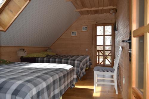 Cama o camas de una habitación en Sodyba Širvynė