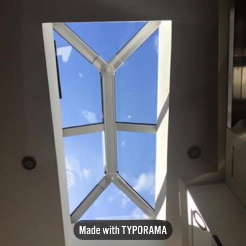 a window in a building with a blue sky at Fairview House in Portstewart