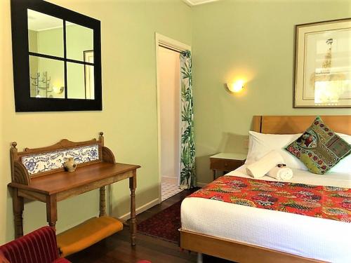 Cama o camas de una habitación en Grey Gum Lodge