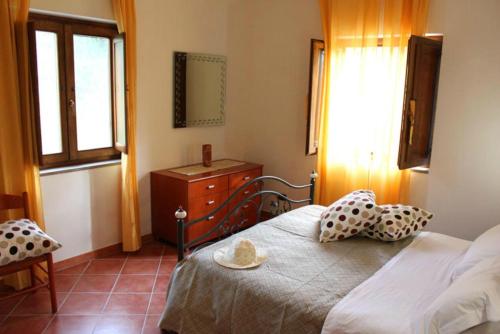 Postel nebo postele na pokoji v ubytování That's Amore Cilento Country House