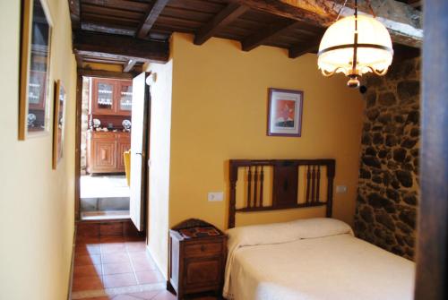 Кровать или кровати в номере Complejo rural Aira Sacra