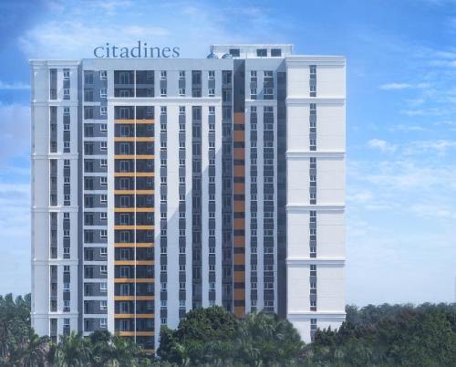 a rendering of a tall building with the word chates on it at Citadines Central Binh Duong in Thuan An